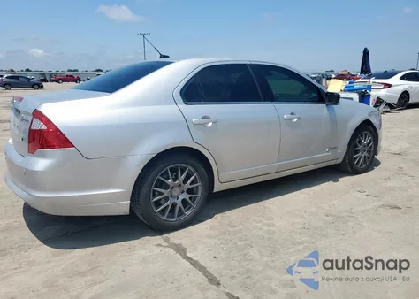 2012 Ford Fusion Hybrid из США, поврежденный, VIN 3FADP0L38CR450279